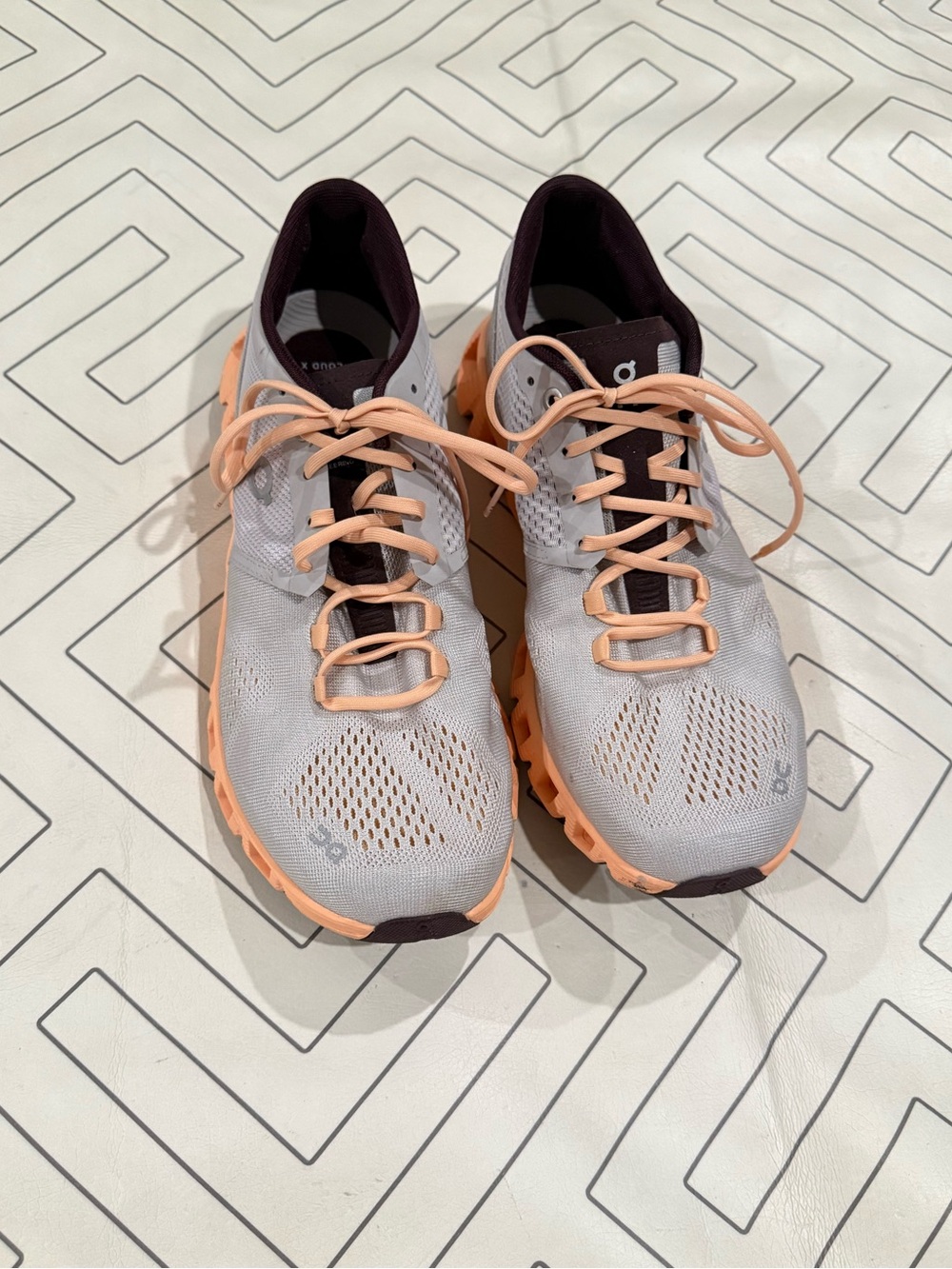 On Running Grey and Orange Sneakers